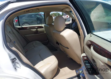 2010 Lincoln Town Car из США, поврежденный, VIN 2LNBL8CVXAX751966